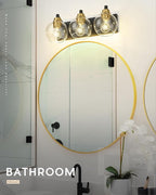 METWET Bathroom Light Fixtures, 3-Light Black and Gold Bathroom Vanity Light, Modern Wall Sconces with Globe Clear Glass Shade, Vanity Lighting Fixtures Over Mirror, VL195-KG-3