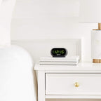 Amazon Basics Small Digital Oval Alarm Clock With LED Display, Nightlight & Battery Backup, Black, 4.5 x 3.5 x 2.4 Inches