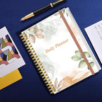 Daily Planner Undated - B5 To Do List Notebook Hourly Schedules, Spiral Appointment Planner for Women and Men, PVC Hardcover, Inner Pocket, Elastic Closure, 7" x 10", Rose Leaf